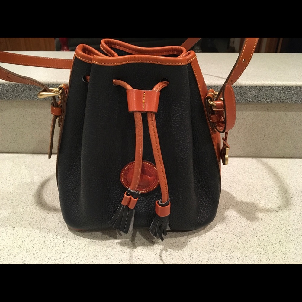 Dooney and Bourke navy pebble grain bucket bag